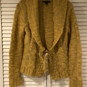 Gold Cardigan with silk ribbon closure in front